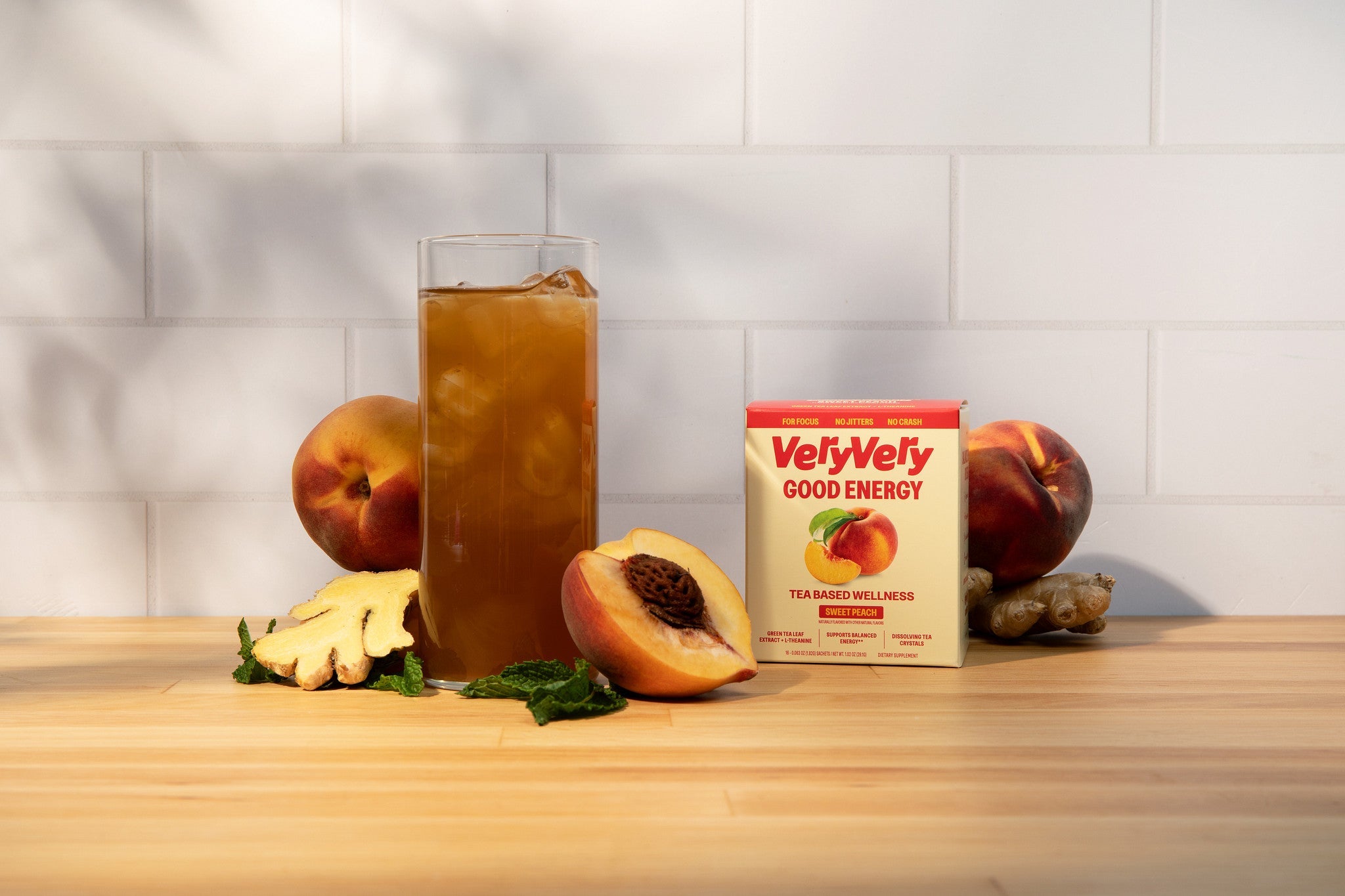 Peach | Energizing Tea — Iced tea preparation on counter