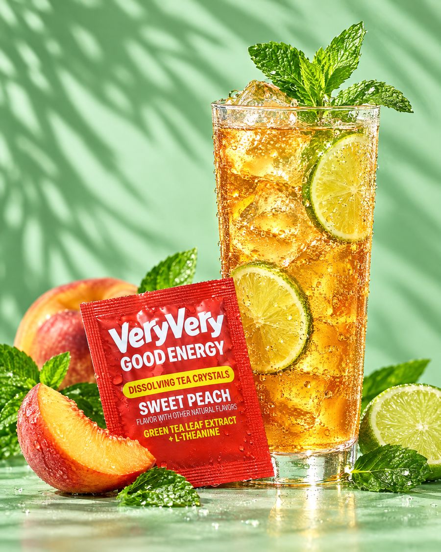 A highball of sparkling tea with lime and mint